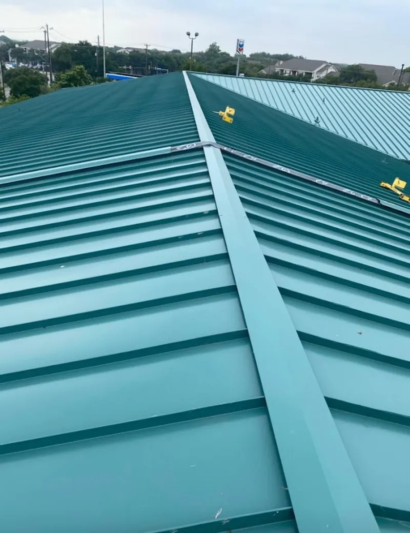 Green commercial metal roof ridge and valley for Metal Roof Repair in Pea Ridge