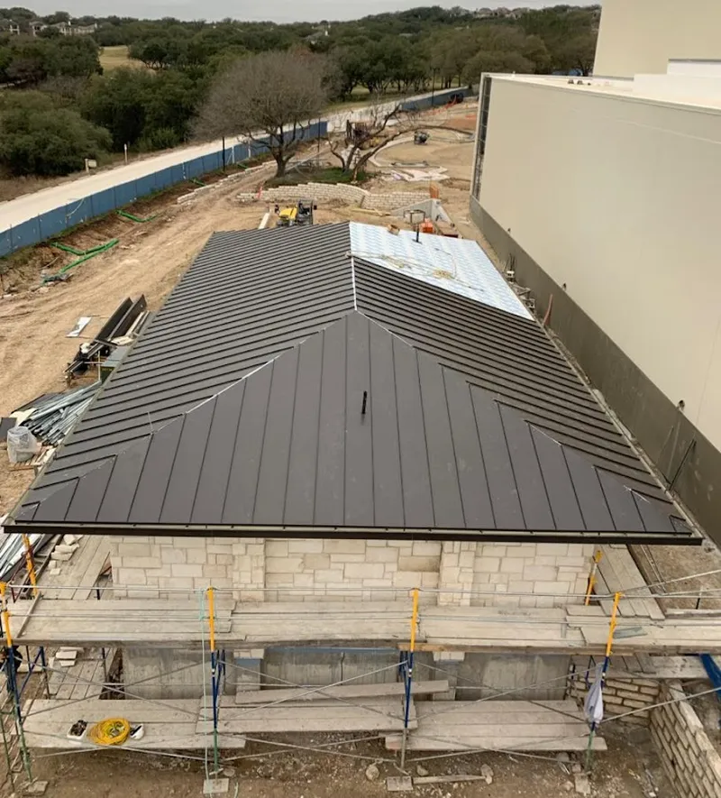 Metal roof new construction with scaffolding in Pea Ridge